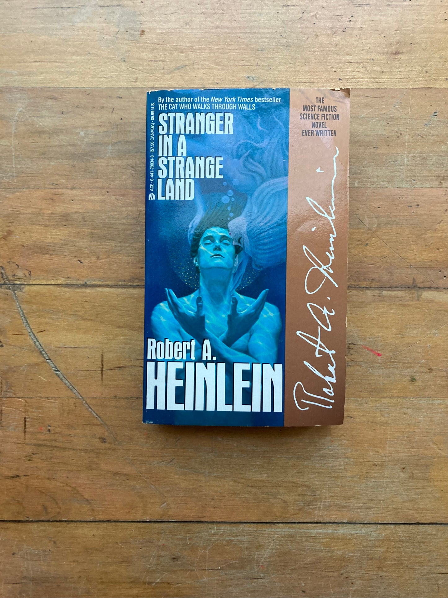 Stranger In A Strange Land by Robert A. Heinlein. Ace Books. 1987.