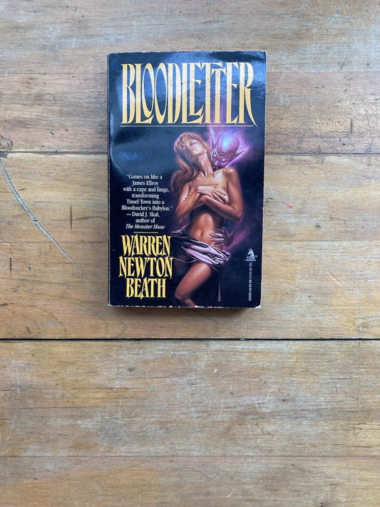 Bloodletter by Warren Newton Beath. A Tor Book. 1996.