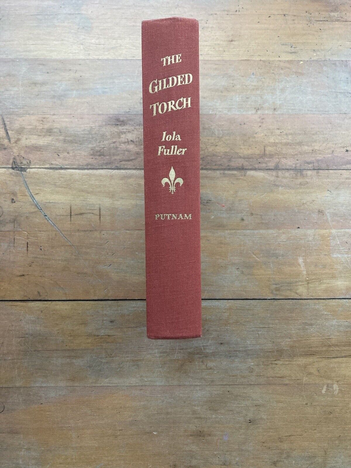 The Gilded Torch by Iola Fuller. G.P. Putnam’s Sons. 1957.