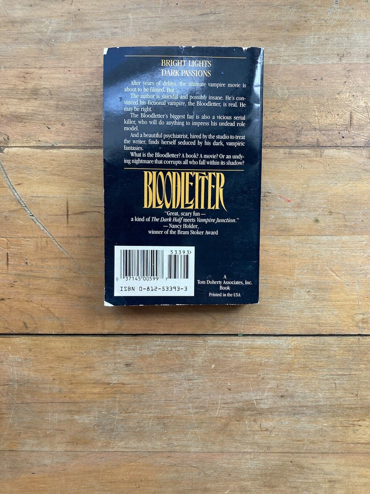 Bloodletter by Warren Newton Beath. A Tor Book. 1996.