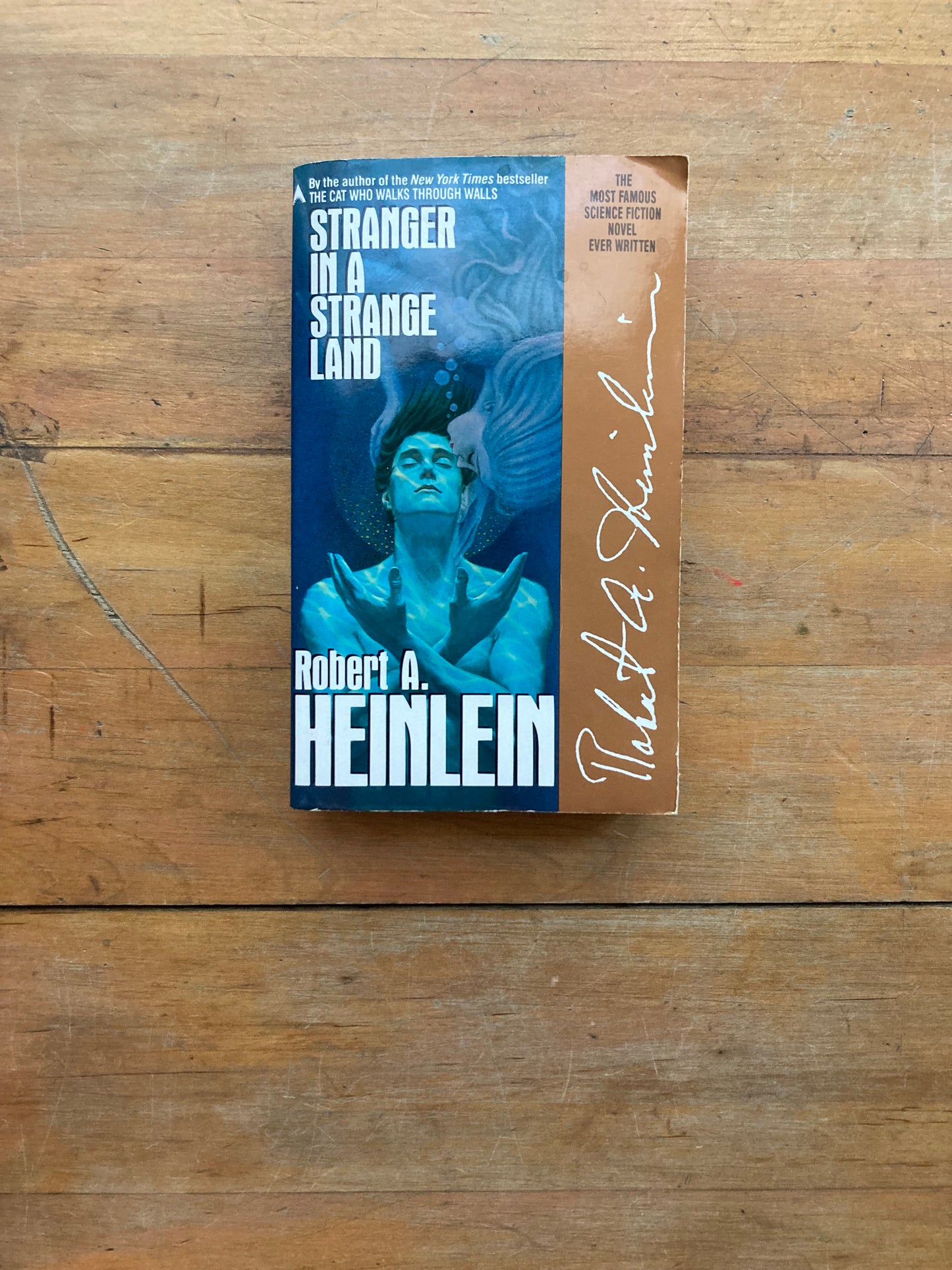 Stranger in a Strange Land by Robert A. Heinlein. Ace Books.