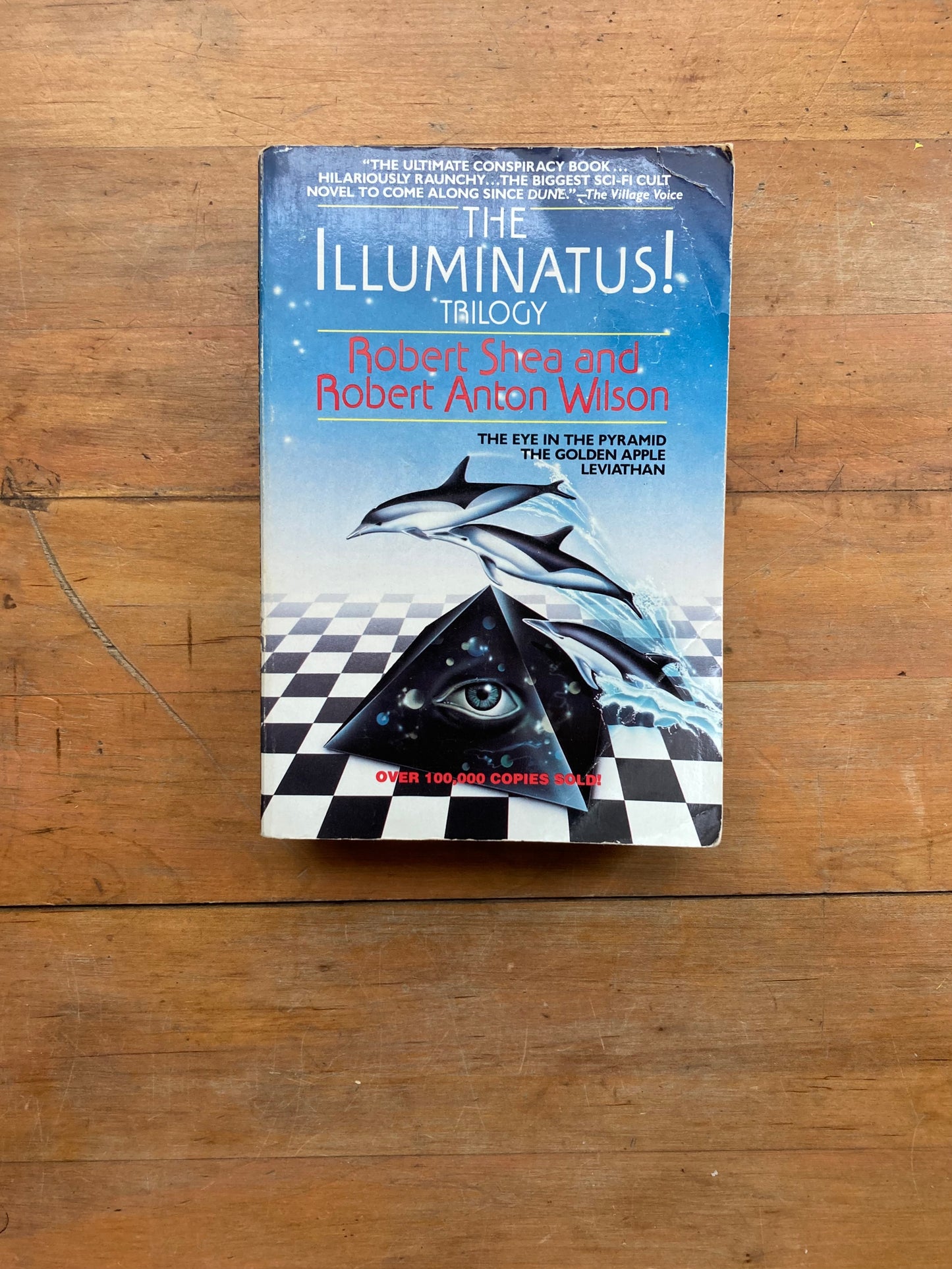 The Illuminatus! Trilogy by Robert Shea and Robert Anton Wilson. A Dell Trade Paperback.