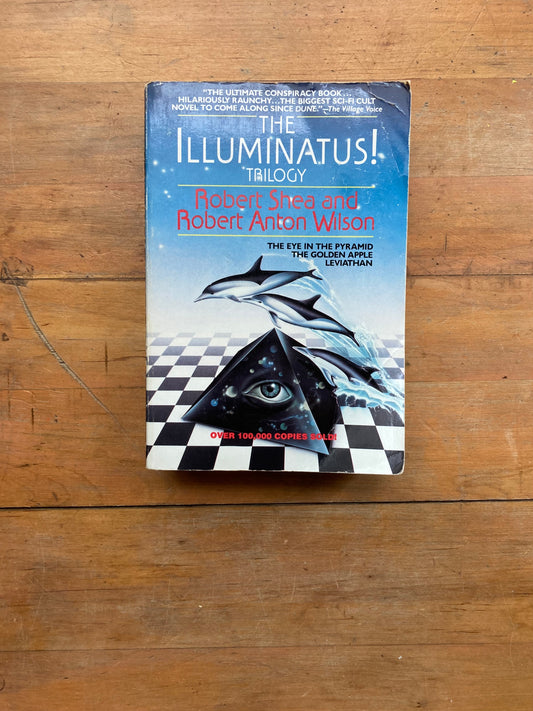 The Illuminatus! Trilogy by Robert Shea and Robert Anton Wilson. A Dell Trade Paperback.