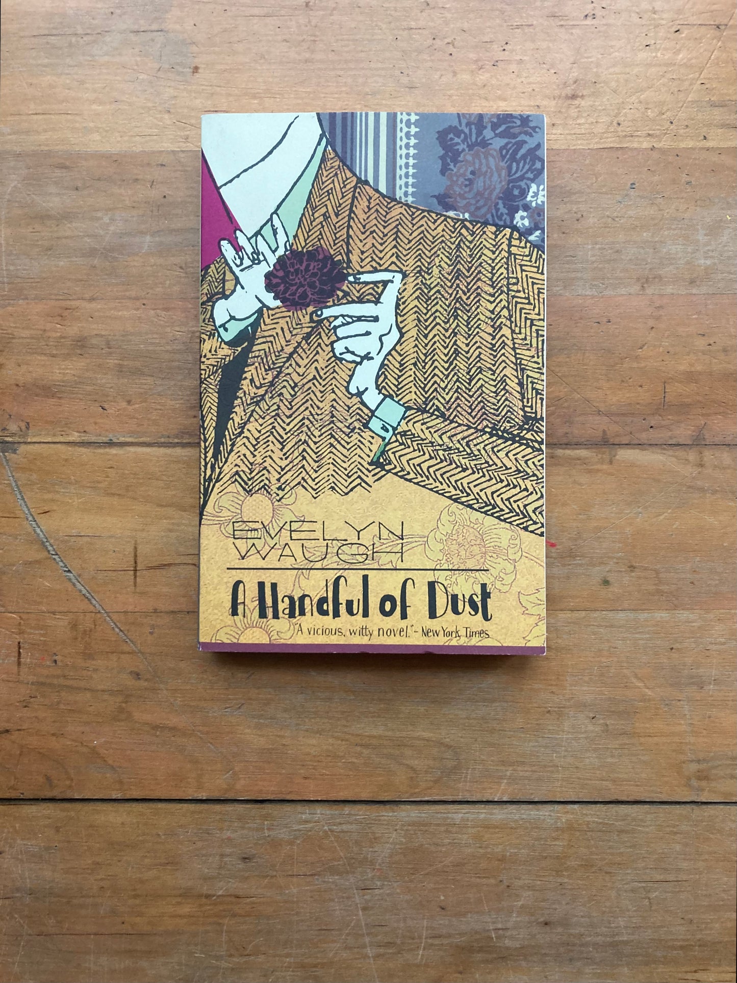 A Handful of Dust by Evelyn Waugh. Back Bay Books. 1999.